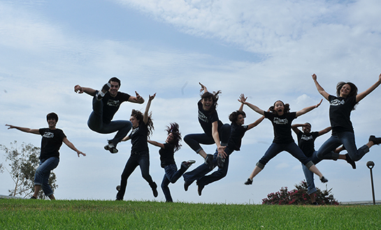 tap dancers leaping in a field
